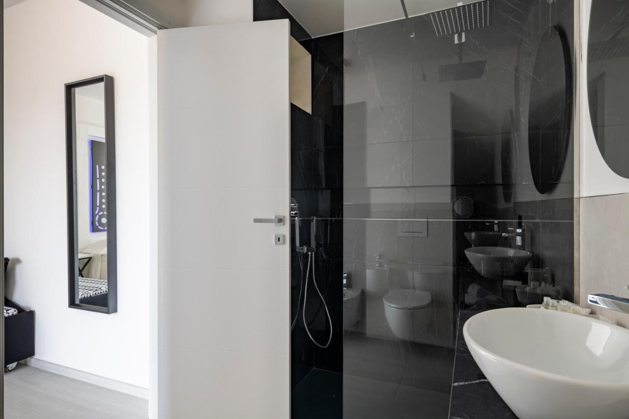 Cara a Bentu - Charming Rooms Tortoli Bagian luar foto