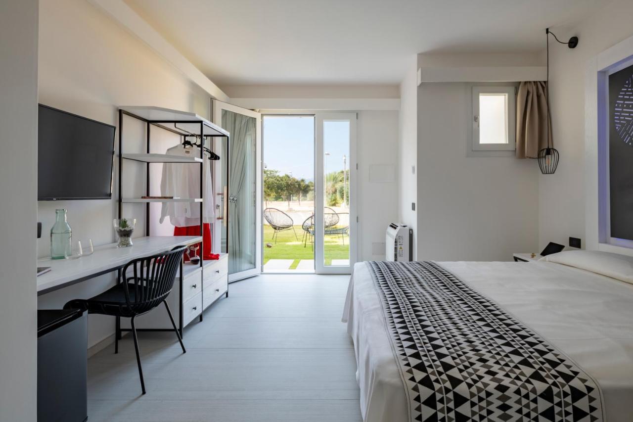 Cara a Bentu - Charming Rooms Tortoli Bagian luar foto