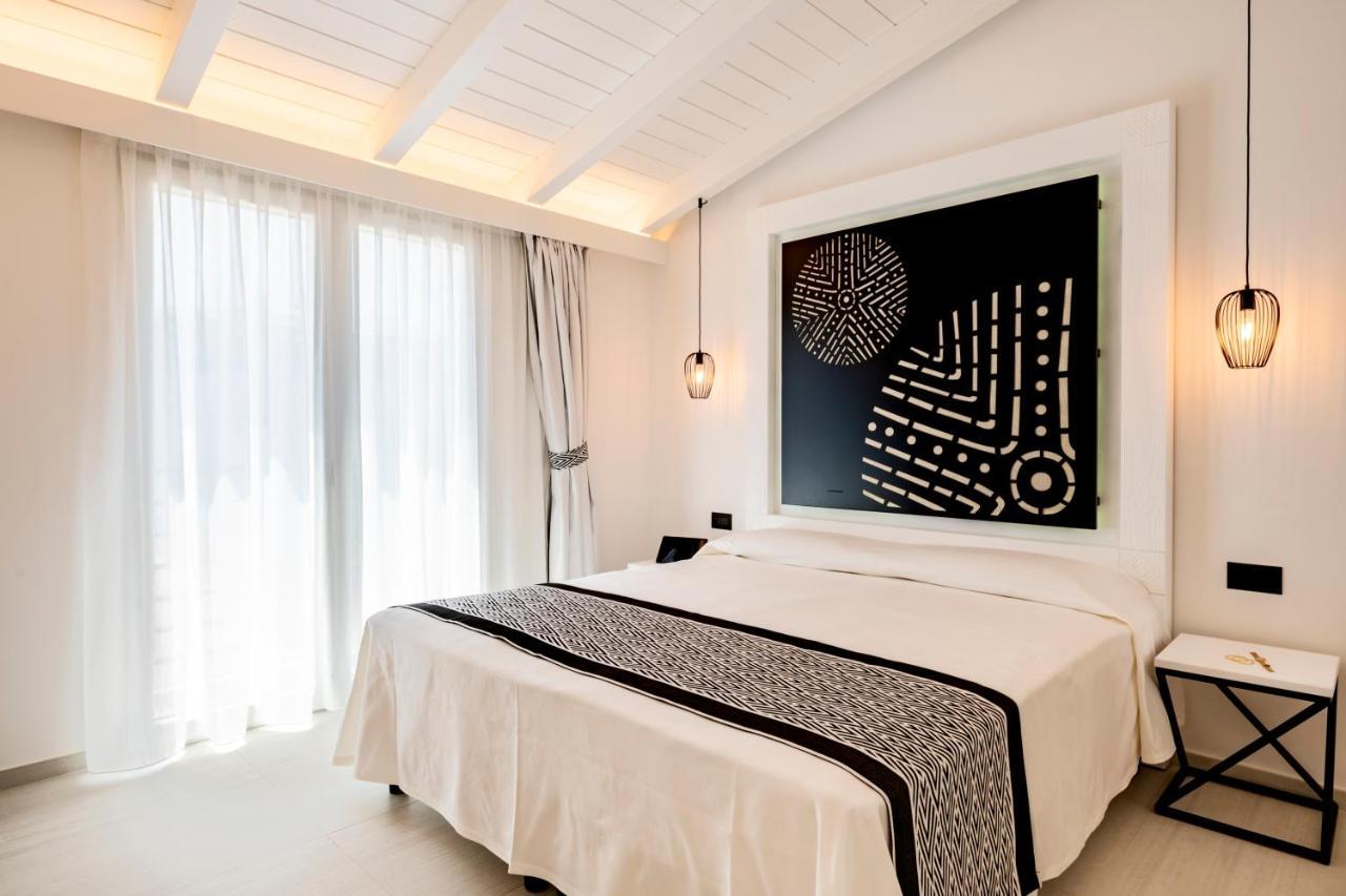 Cara a Bentu - Charming Rooms Tortoli Bagian luar foto